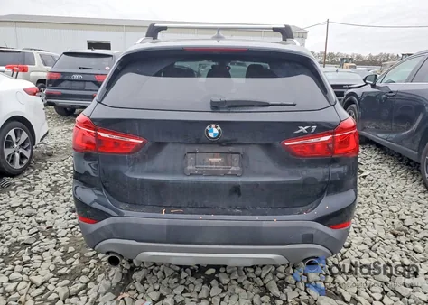 2018 BMW X1 xDrive28I из США, поврежденный, VIN WBXHT3C33J5K21181